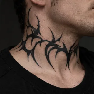 Blackwork tribal thorn style neck tattoo