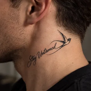 Swallow bird and script lettering neck tattoo