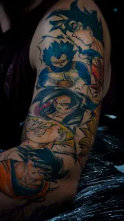 Dragon ball anime character collage upper arm tattoo