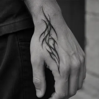 Blackwork tribal style hand tattoo