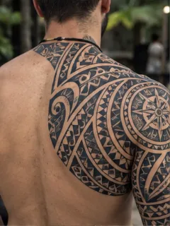 Polynesian tribal shoulder and back tattoo with compass motif