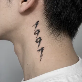 Brush stroke style 1997 number neck tattoo