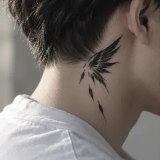 Abstract blackwork wing neck tattoo