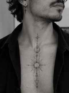 Fine line geometric sun and moon sternum tattoo