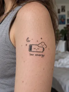 Minimalist low energy battery and cloud upper arm tattoo