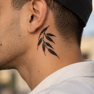 Blackwork leaf branch neck tattoo