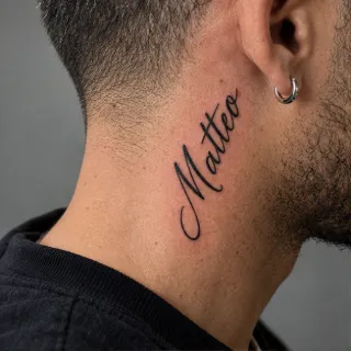Script lettering matteo name neck tattoo