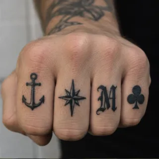 Anchor compass star letter m and club symbol knuckle tattoo