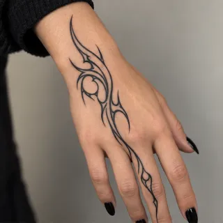Blackwork tribal style abstract line art hand tattoo