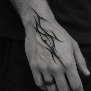 Abstract blackwork tribal lines hand tattoo