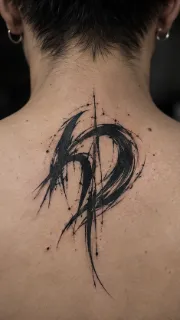 Abstract blackwork brushstroke style upper back neck tattoo