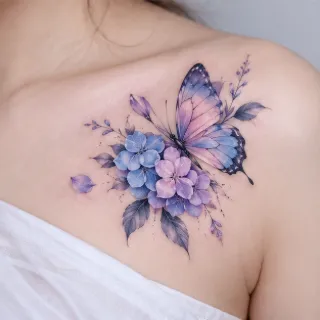 Watercolor butterfly and blue purple flower collarbone tattoo