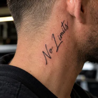 No limits script lettering neck tattoo