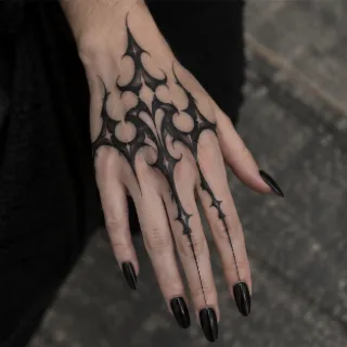 Blackwork ornamental gothic style hand tattoo